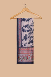 Floral patterned fabric on a wooden hanger against a beige background
