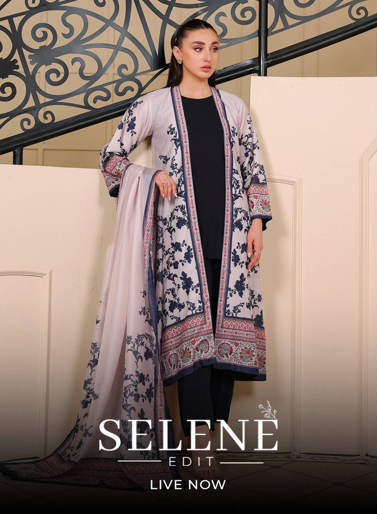 Woman wearing a floral patterned outfit with 'Selene Edit' branding.